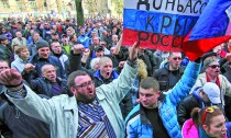 Pro-Russian demonstrators take part in a rally in Donetsk